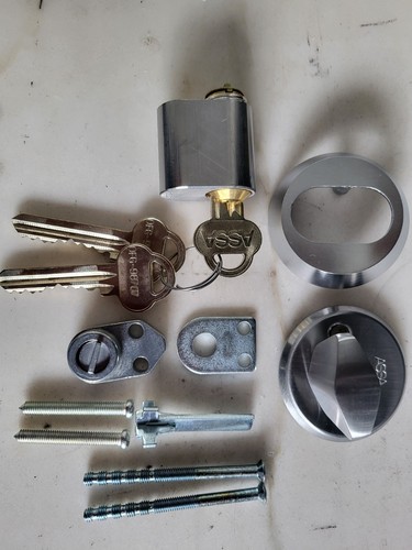 Assa cylinder and thumb - and,